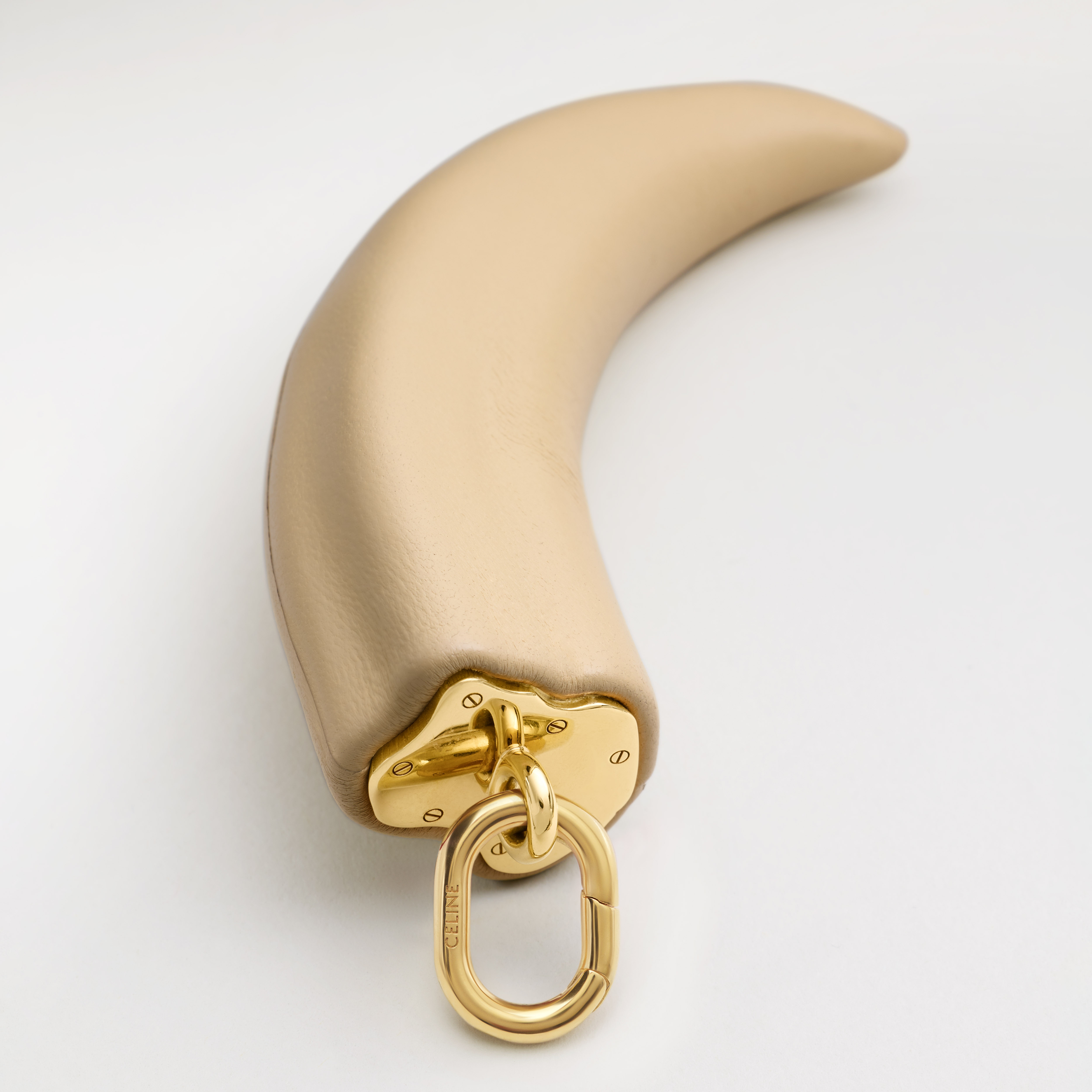 CELINE CHARMS SMALL HORN IN RESIN, LEATHER AND BRASS WITH GOLD
